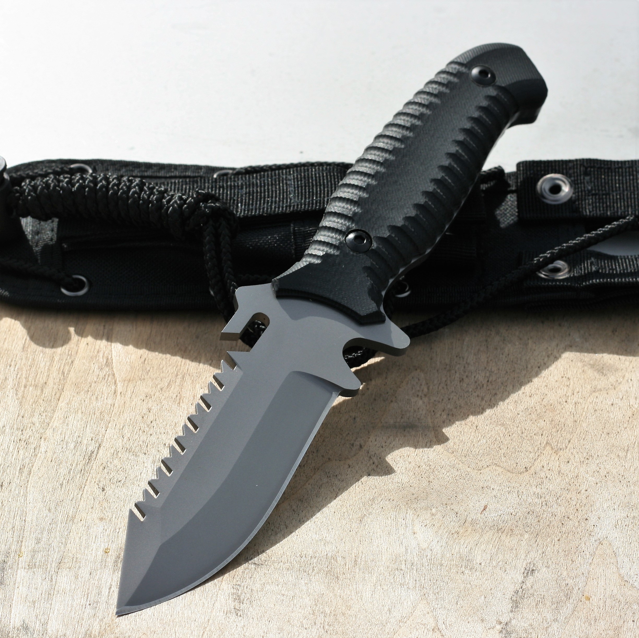 STEC - 10″ Fixed Blade Knife Full Edge w/ Saw on Blade Spine